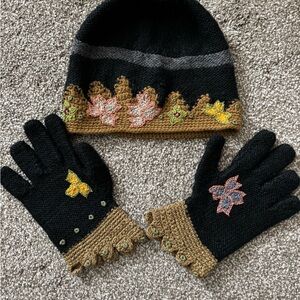 Chic Black and Brown Hat with Floral Details